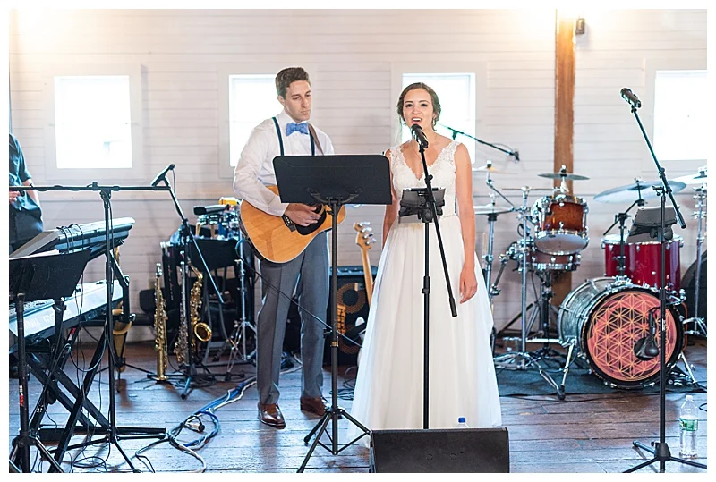 Bridge and groom sing at Gedney Farm wedding