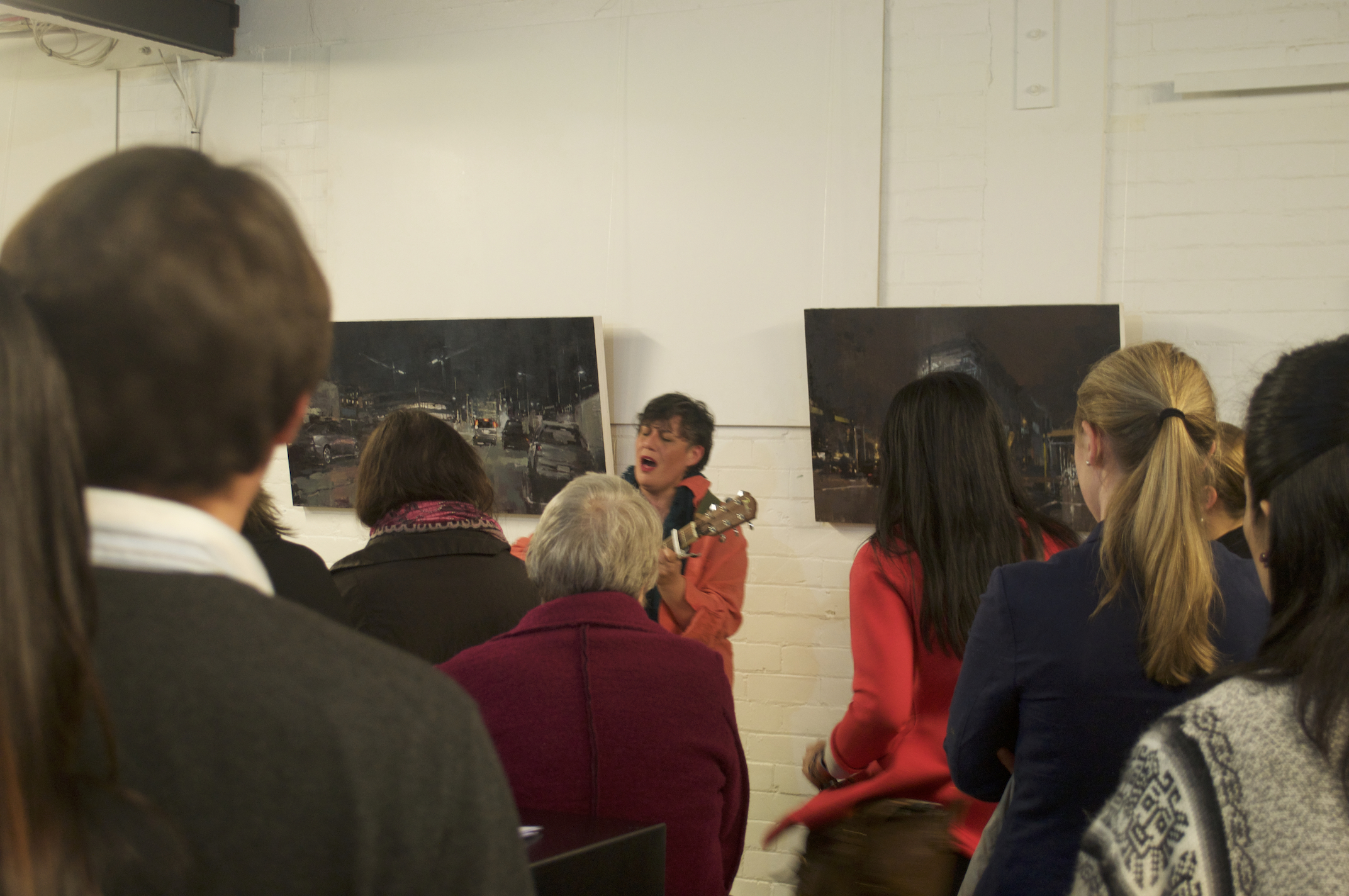 Lisa Tui performs an original piece at Liam's exhibition.