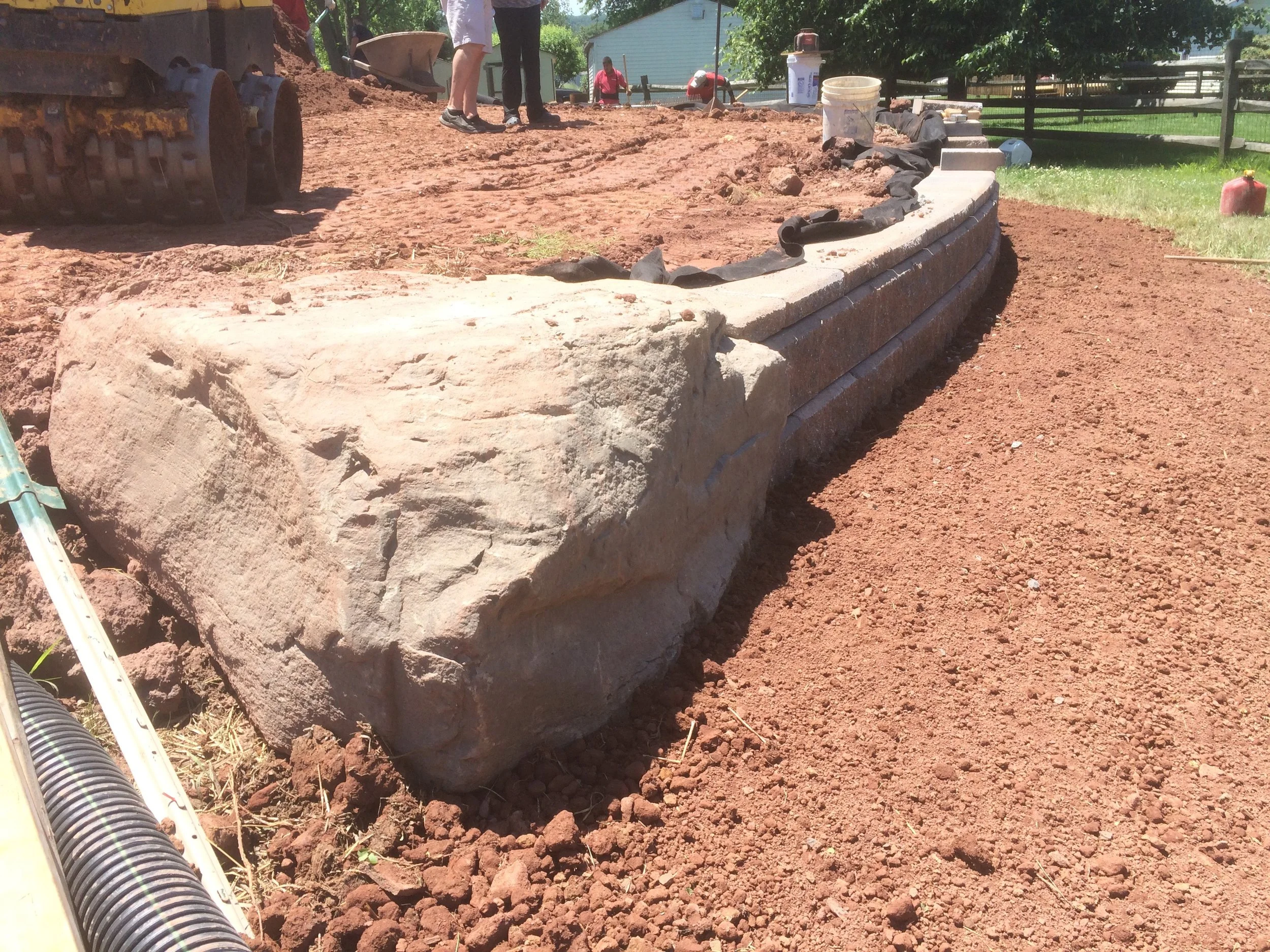 Pondworks_pond_construction_boulder_wall.jpg