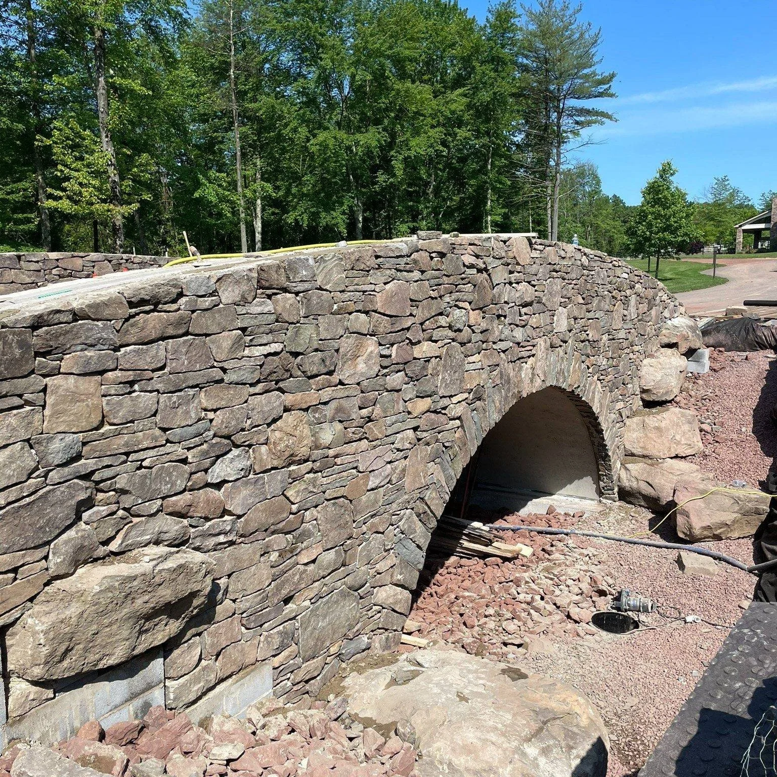 And that's a wrap on the bridge! The stone and coping came together beautifully.

#ponddesign #coolponds #largeponds #farmpond #designbuild #backyardconcepts #montgomerycountypa #ProjectProgress #projectprogress #pond #pondworks_online #pondlife #pon