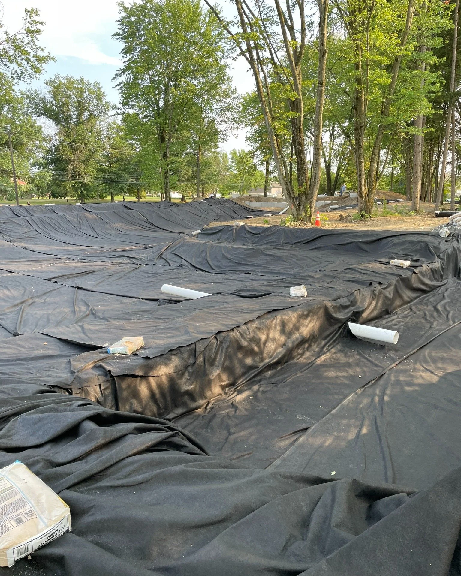 After careful preperation, grading and the creation of two more constructed wetland zones. We are now installing non-woven fabric for this 3/4 acre pond.

#ponddesign #coolponds #largeponds #farmpond #designbuild #backyardconcepts #montgomerycountypa