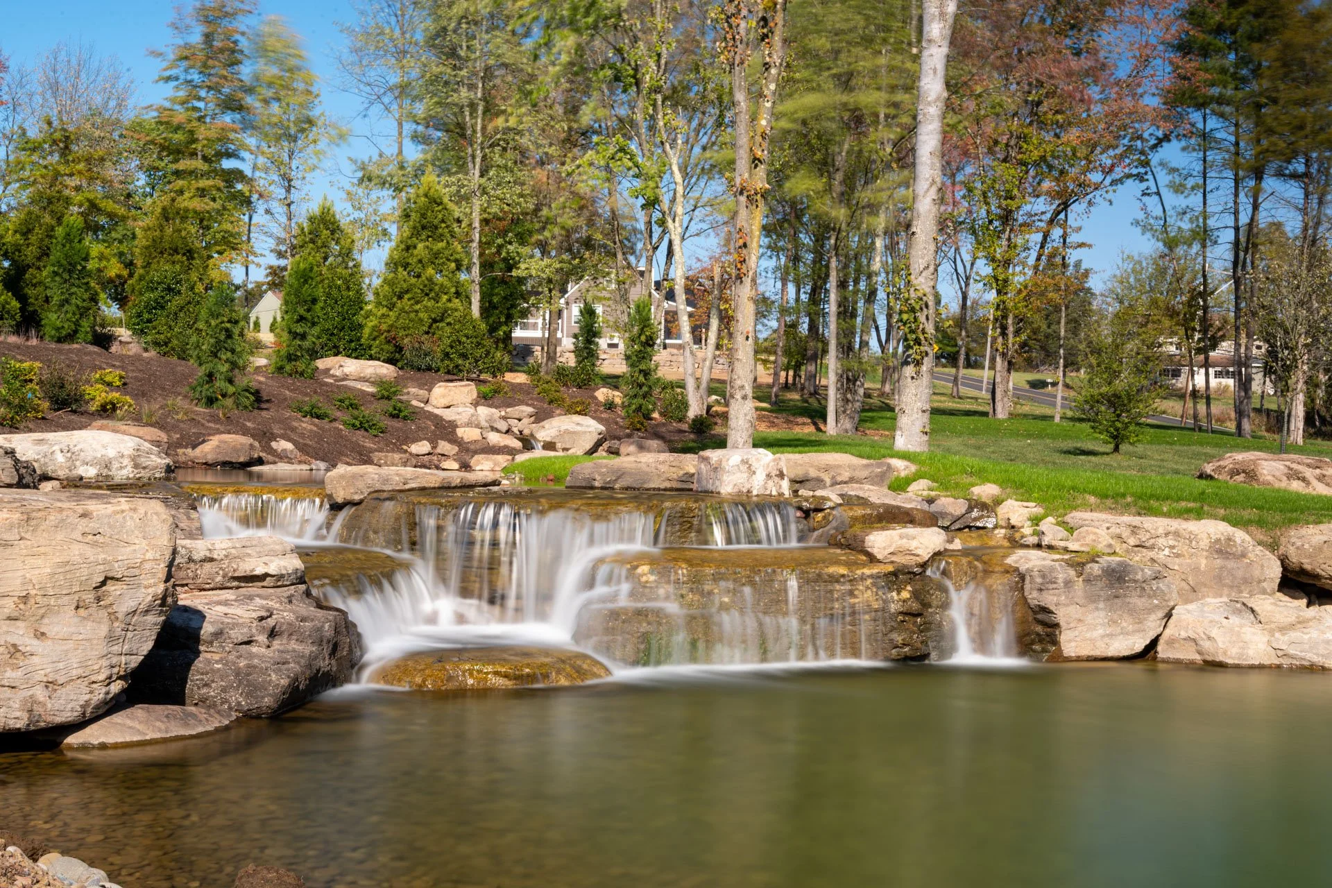 a-welcome-home-large-pond-waterfall-boulders.jpg