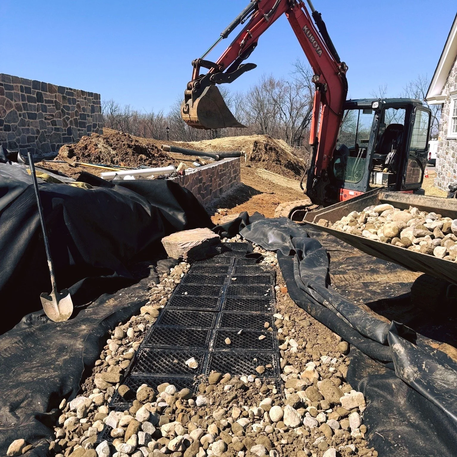 Every great waterfall starts with a trench. 🪨
We&rsquo;re deep into this pondless waterfall build in Chester County, PA &mdash; and the dry weather this week has been on our side. Multi-level intakes are going in to handle our 20,000 GPH flow rate, 