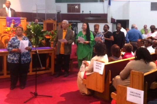 Leaders of the 30 congregations in the Charleston Area Justice Ministry declare their commitments at the CAJM rally at Mount. Moriah Baptist Church on Monday night.