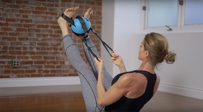 Using the loop straps and removable straps is one effective way to stretch the hamstrings
