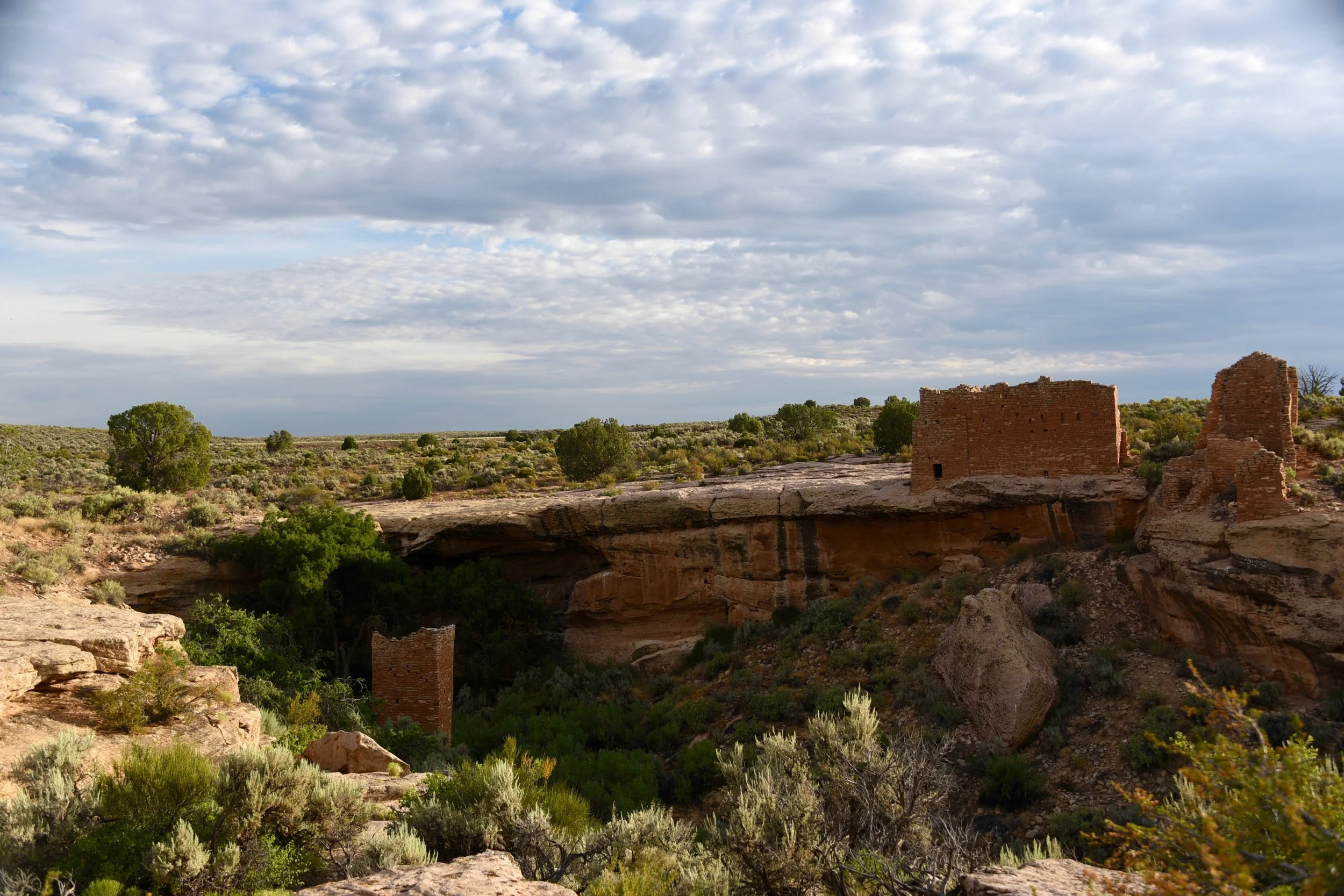 A view of Square Tower (in the bottom of the canyon) and Hovenweep castle.