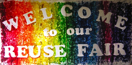 Reuse Fair sign is made from two used tablecloths and used crayons