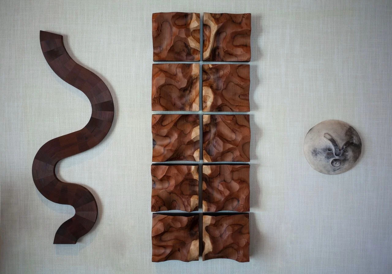 Wall sculptures by Lutz Hornischer (wood) and Carole Neilson (ceramics)