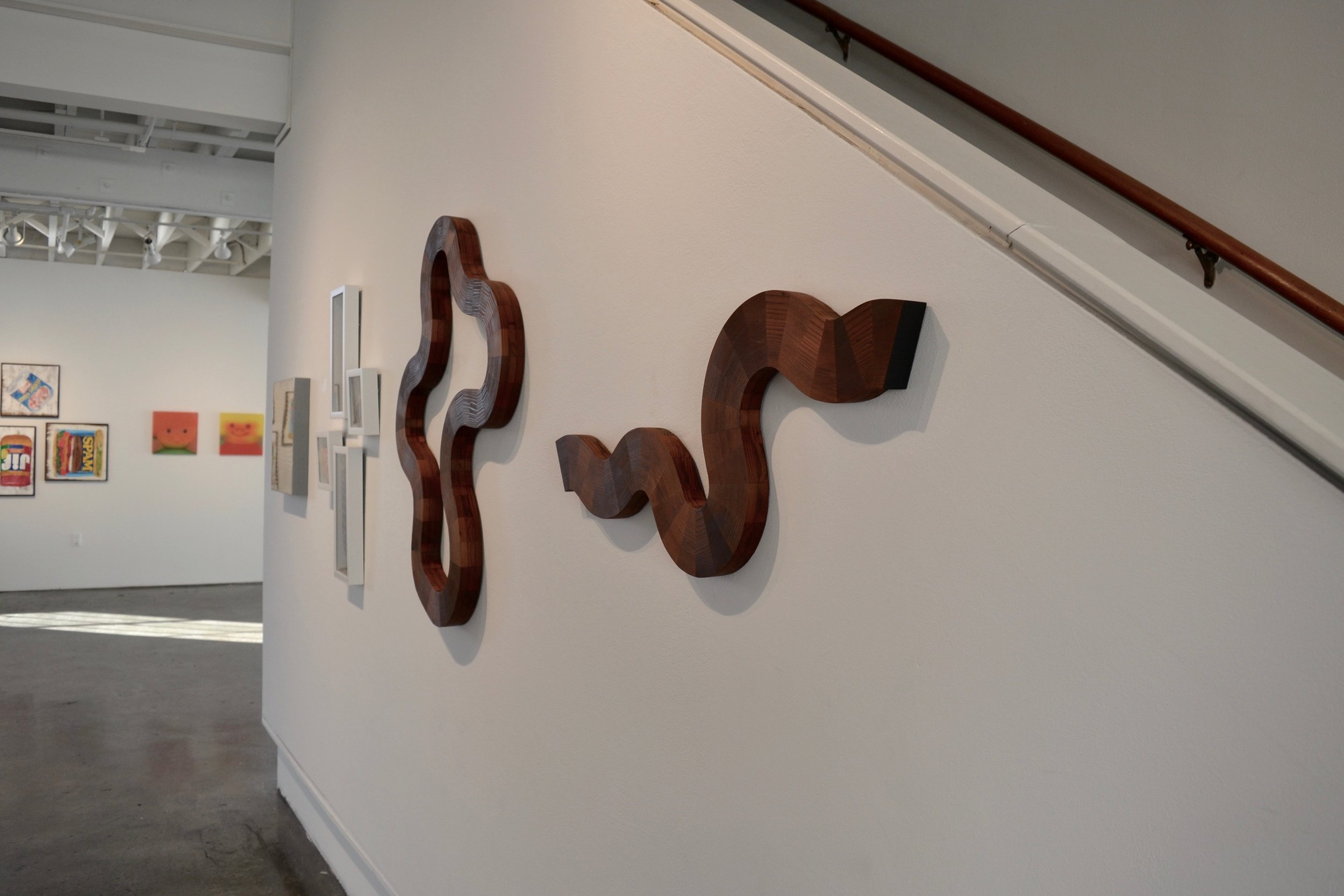 Wall sculptures “Fluid” and “Curious” by Lutz Hornischer at SFMOMA Artists Gallery