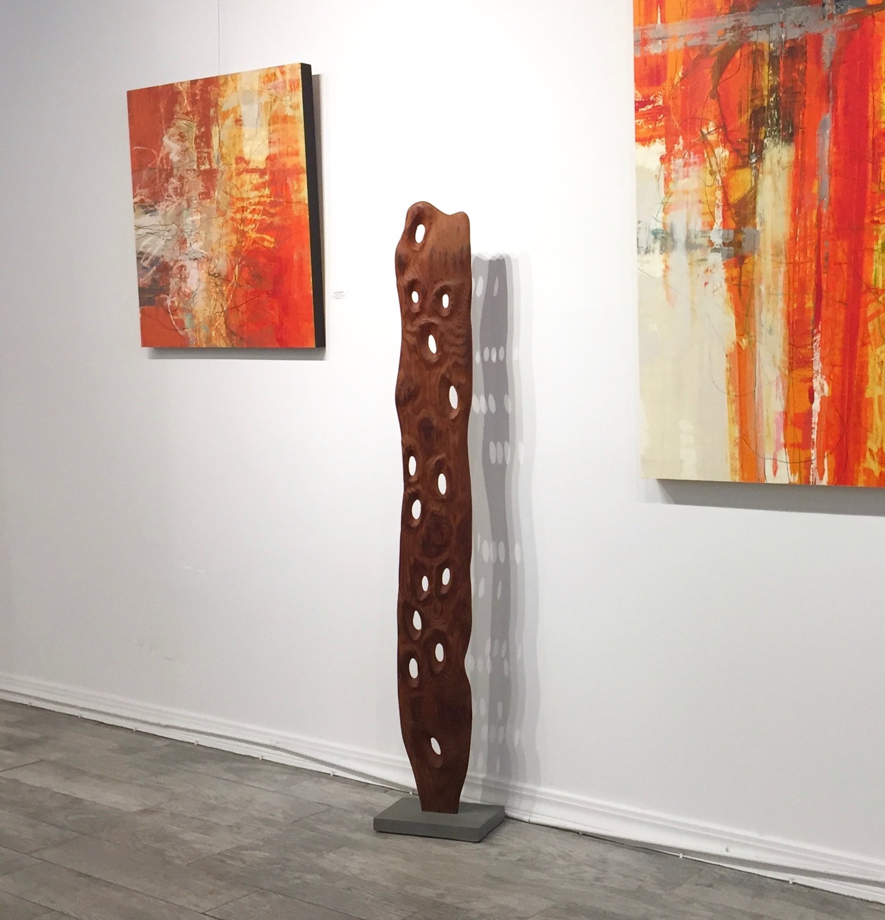 Desta Gallery in San Anselmo: Modern sculpture “Bubbles” by Lutz Hornischer. Paintings in the background by John Wood. (www.johnwoodart.com)