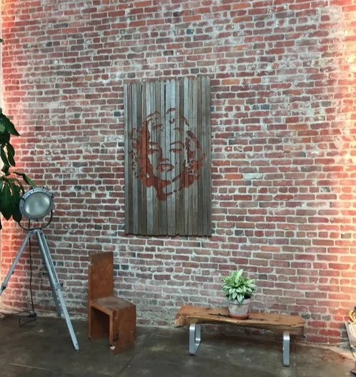 Reclaimed wood wall art “Marilyn” at event office space in Berkeley