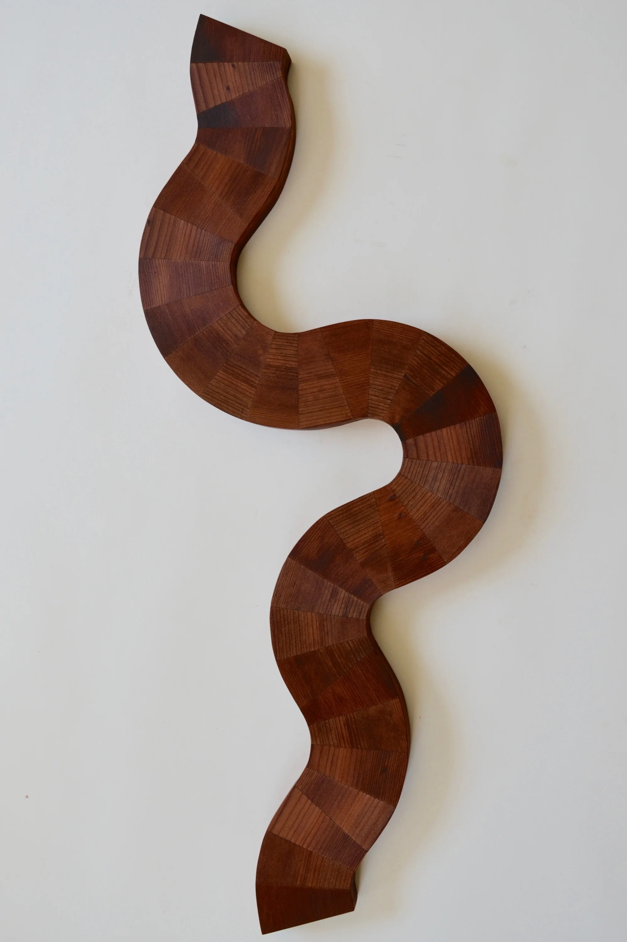 Curious-vertical-wall-sculpture-by-Lutz-Hornischer.jpg