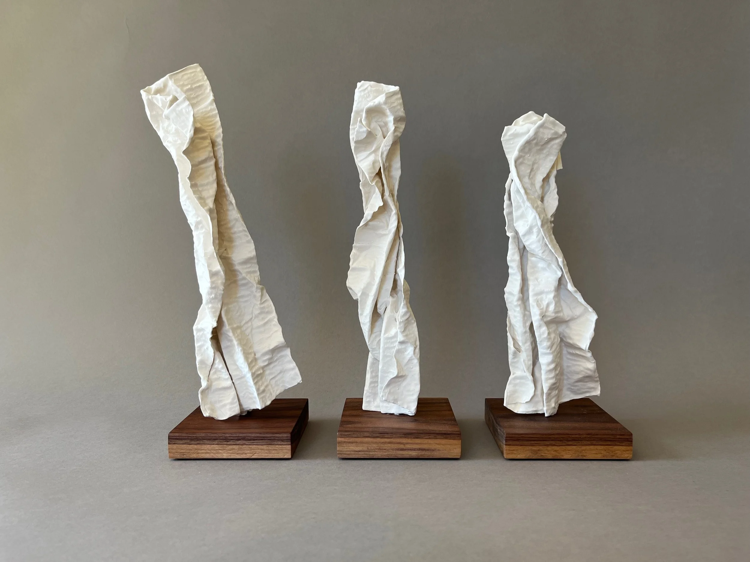 Leaning In 6 plaster sculptures by Lutz Hornischer.jpeg