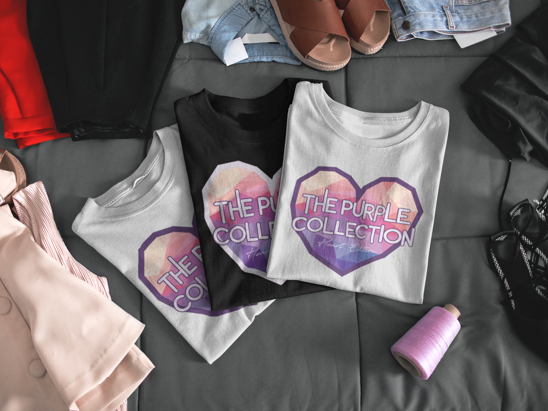 mockup-of-three-t-shirts-lying-folded-on-a-bed-a16939.png