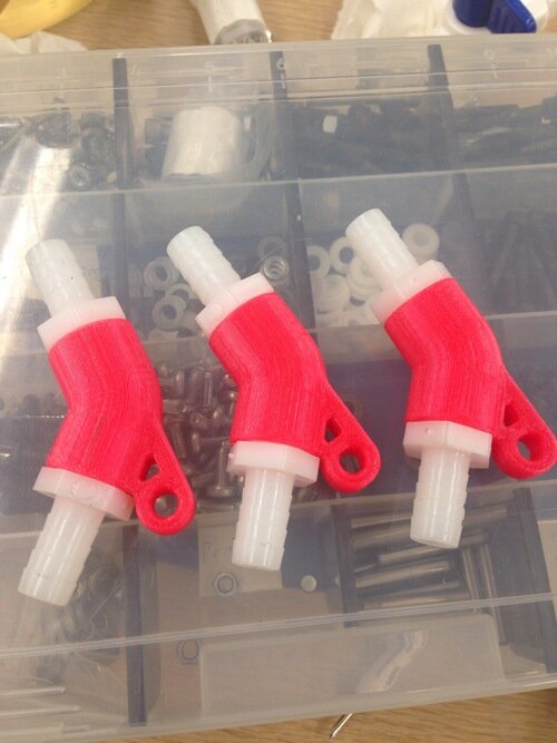 After discovering that high-speed water doesn't resemble an ideal gas, we improved our plumbing to reduce the occurrence of large degree angles. I 3D printed some hydraulic muscle fittings with a less severe angle. It worked great, however great car
