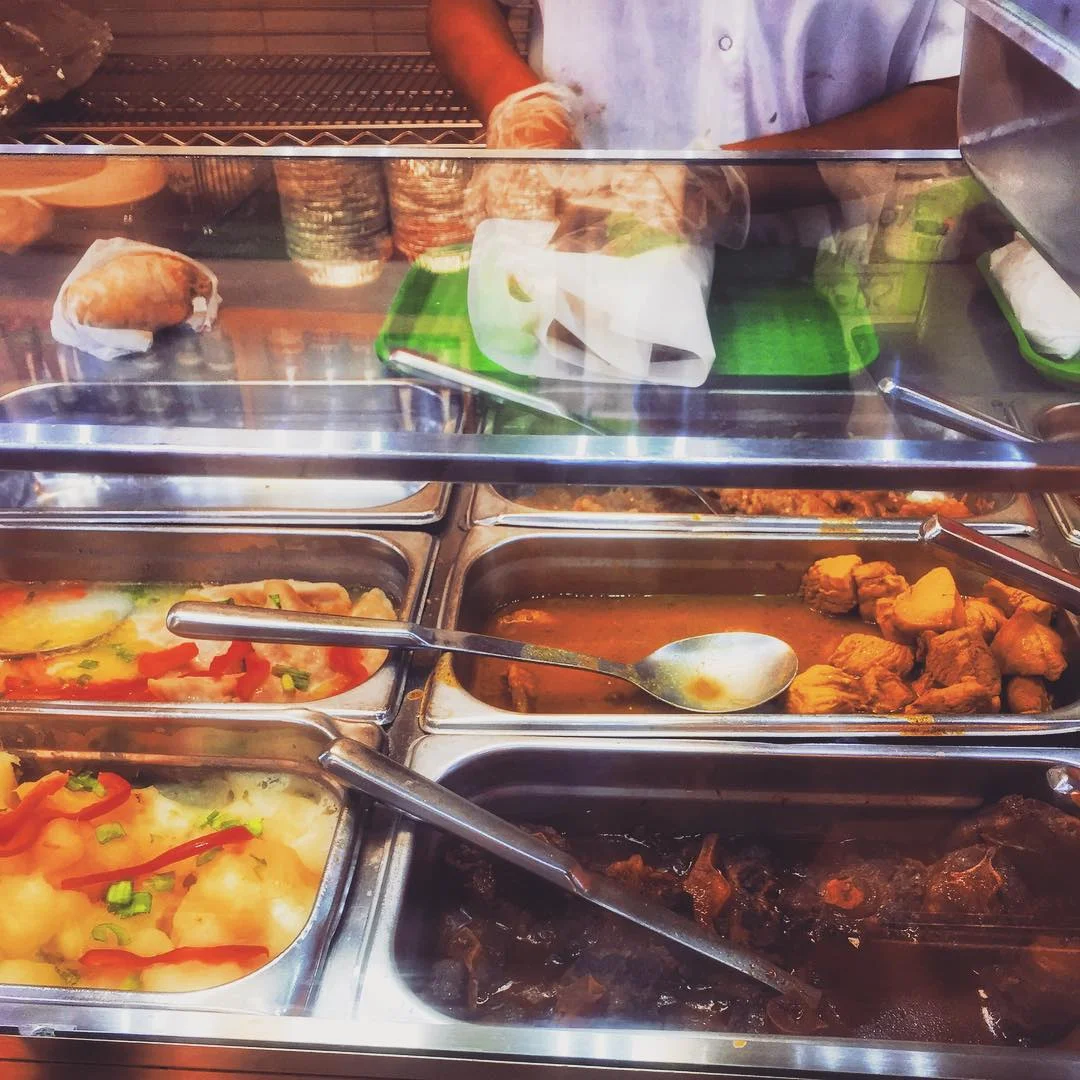 Day 79/100: Took a short detour on the way home from #Rockaway to #SouthOzonePark to get some Trinidadian food. I’m now obsessed with doubles – which are a big pile of mush when wrapped up to go but SO good. Made of a kind of fried flattened “bread” and filled with channa (chickpeas) among other toppings and just the right amount of pepper sauce. We also got the boneless chicken roti which was also tasty but dry.
#trinifood #southozonepark #ozonepark #richmondhill #queens #queensnyc #queensny #itsinqueens #queenscapes #ozoneparkfood #food #heartofqueens #100DaysOfQueens (at Trinciti Roti Shop and Restaurant)