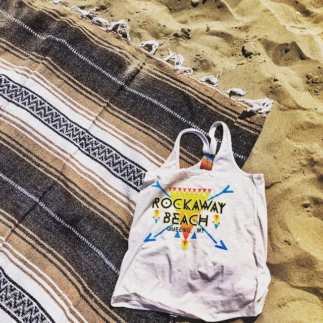 Day 28/100: Wishing it was not foggy (and the weekend) so here’s a pic of some of the goodies I picked up in #Rockaway a couple weeks ago. Beach blanket is from my favorite local mobile boutique @endofthea & the tank is from the cutest new shop on 116th @lola_star (at Rockaway Park – Beach 116th Street)