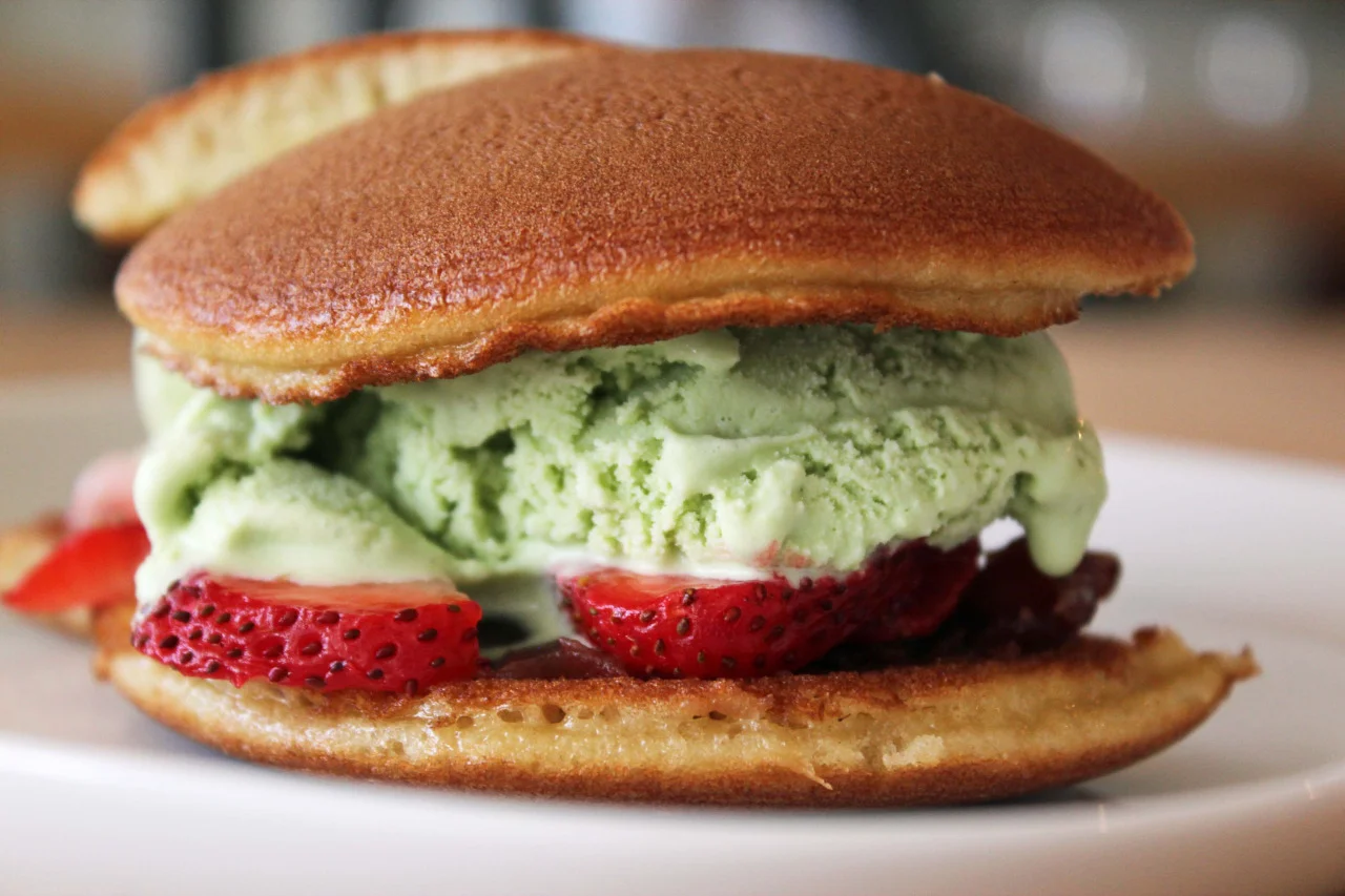 queenslove :
Just got a little giddy over this Japanese treat at Hibino LIC . It’s a strawberry dorayaki—a stack of two wonderfully spongy pancakes stuffed with a smear of sweet red bean paste, halved strawberries, and a generous scoop of green tea ice cream. 10-70 Jackson Avenue, LIC