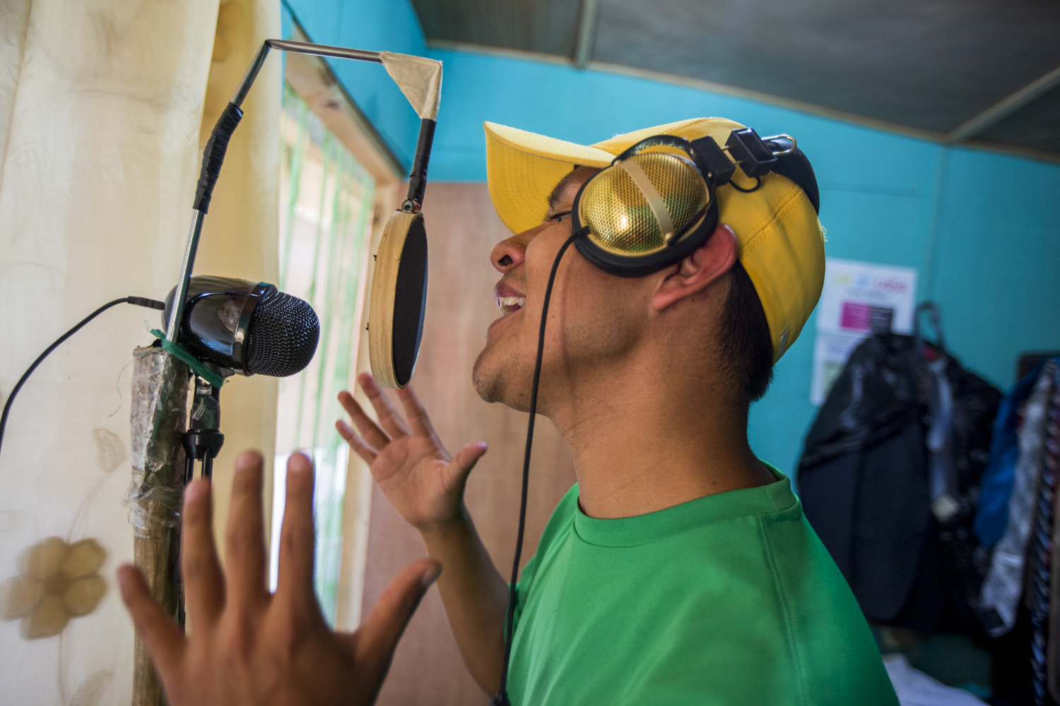 Jasy Mendoza, 23, member of Poesía Loca, records a song in his house in San Juan La Laguna, Lake Atitlán on December 22, 2018. Mendoza made his recording studio in his room but also often practices in his producers’ studio or the central park of San Juan La Laguna.