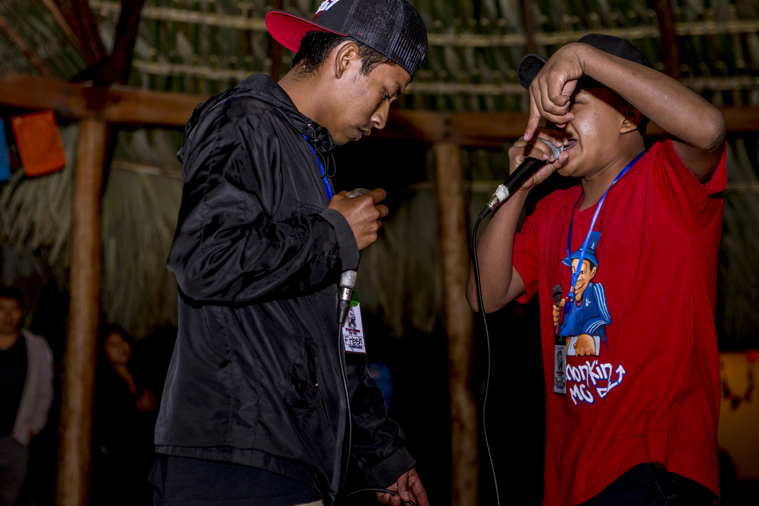 Miguel Ixcaya “Princsboys” left, raps against Fresh Mc, during a freestyle competition group Juun Ajpu Koj, in San Marcos La Laguna, Lake Atitlán, on December 15, 2018.