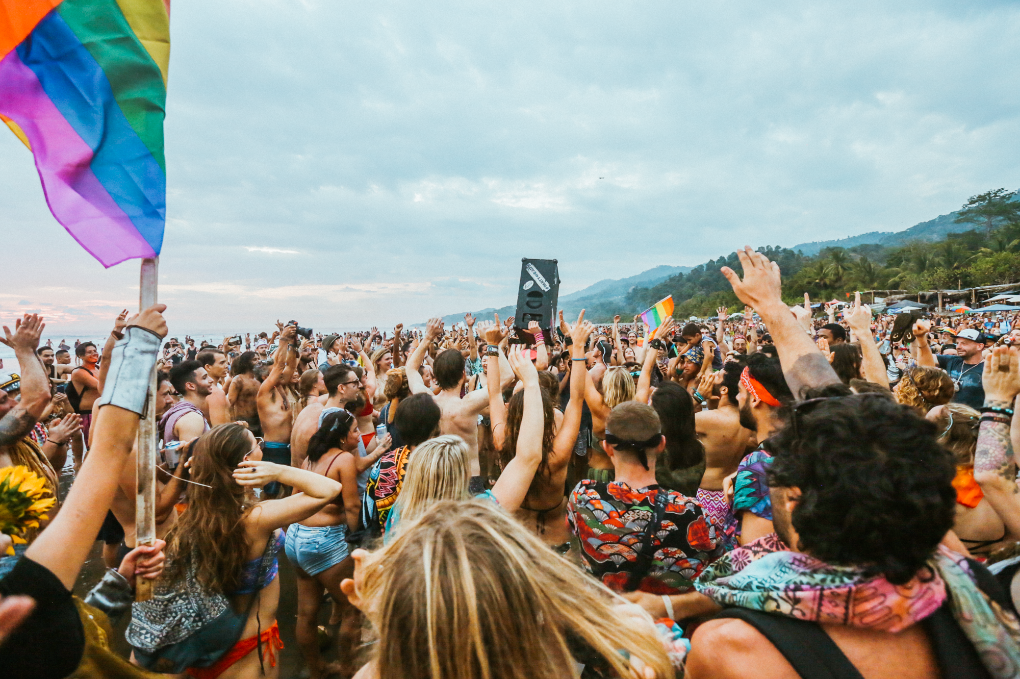 People come together, dance and party during an LGBT party on Uvita beach in Costa Rica, during Envision Festival.