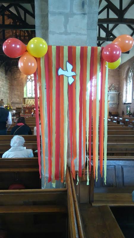 All Saints' Church recently celebrated Pentecost with balloon, banners and cake of course!