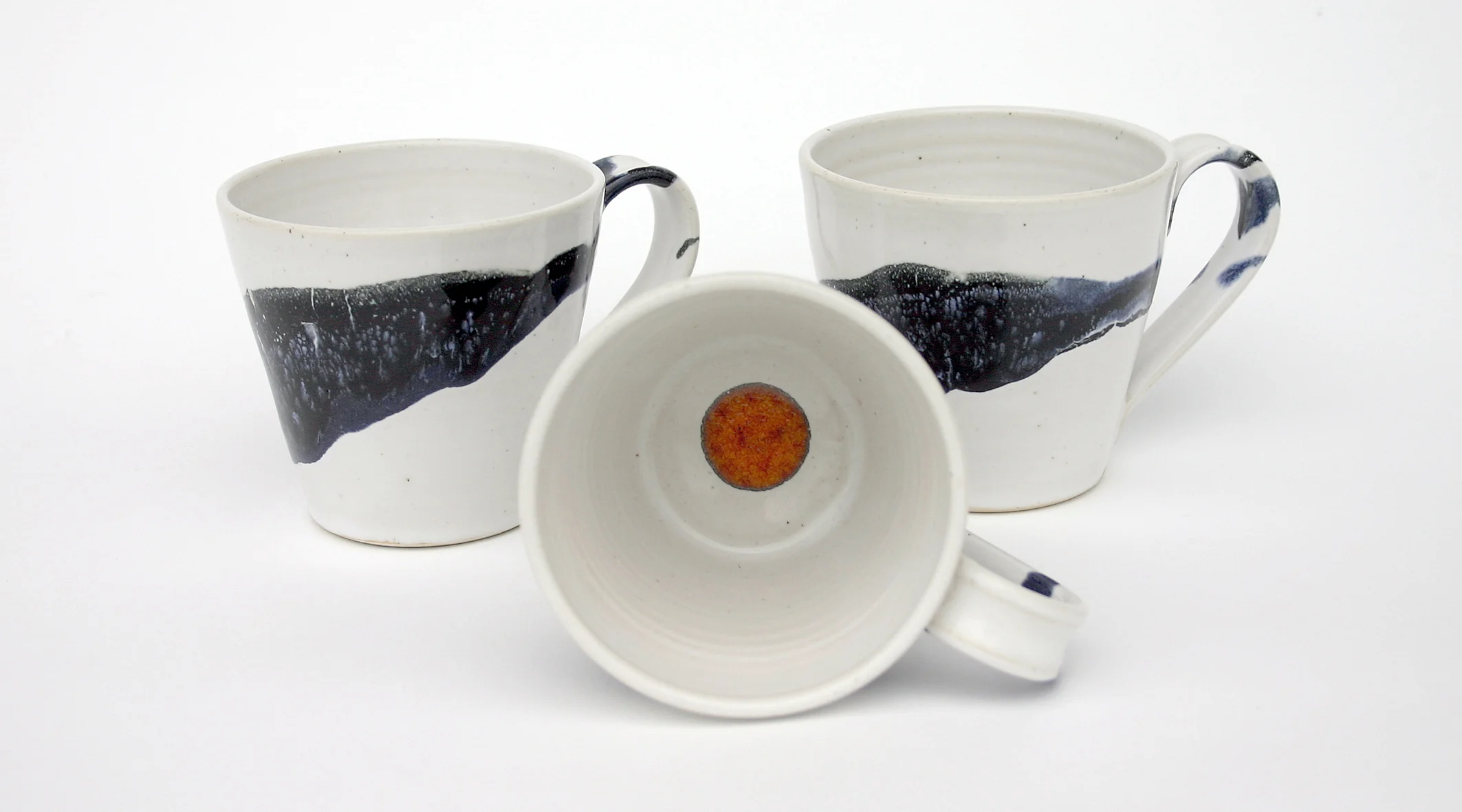 Blue and Black Splash with Orange Dot