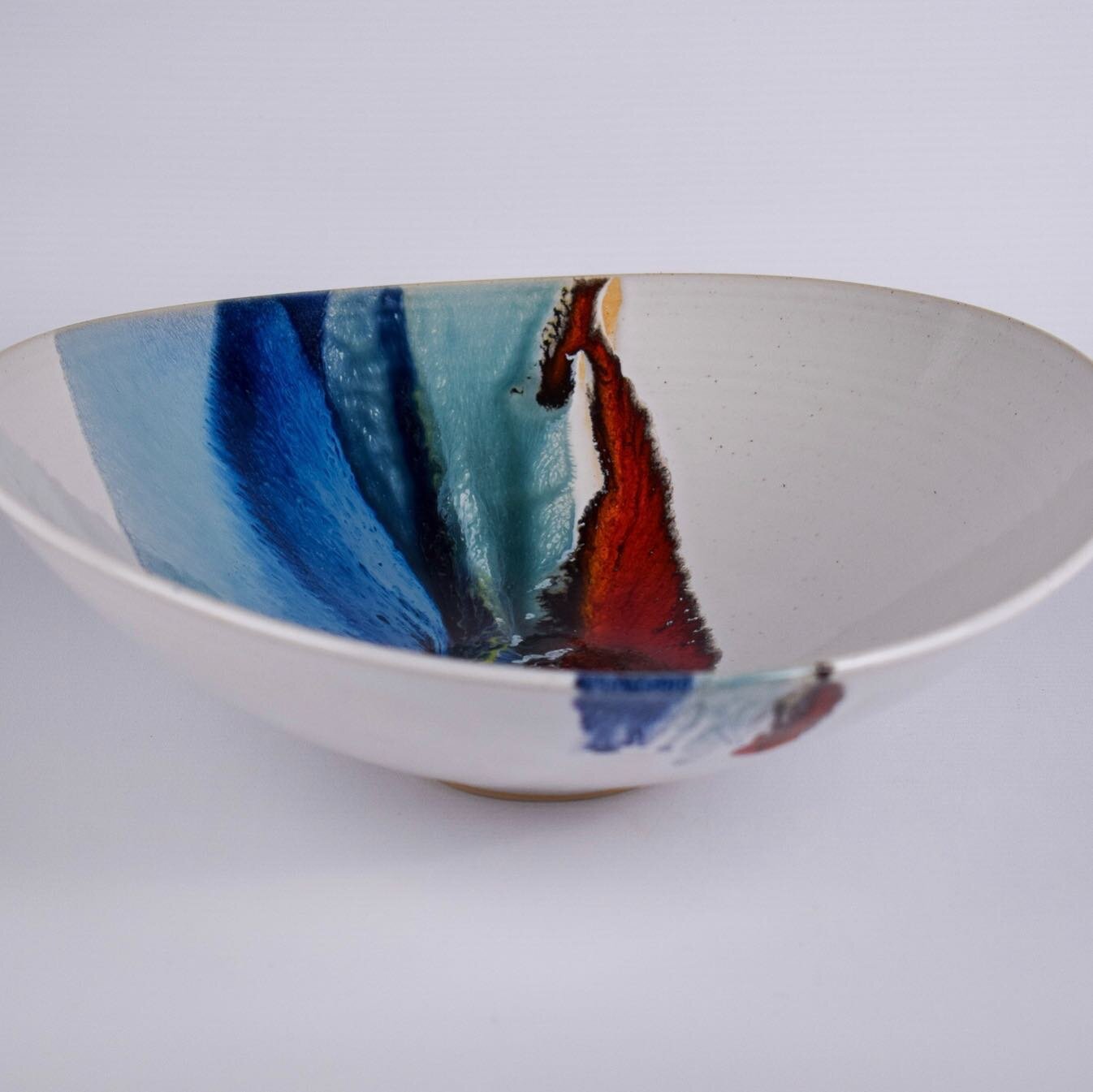 Multicolour Glaze Footed Bowl  https://www.davidmellordesign.com/craft-pottery-and-woodware/craft-pottery-ranges/michael-taylor-bowls/multicolour-glaze-footed-bowl-315mm-michael-taylor  #michael_taylor_ceramics #contemporaryceramics #wheelthrown #mod