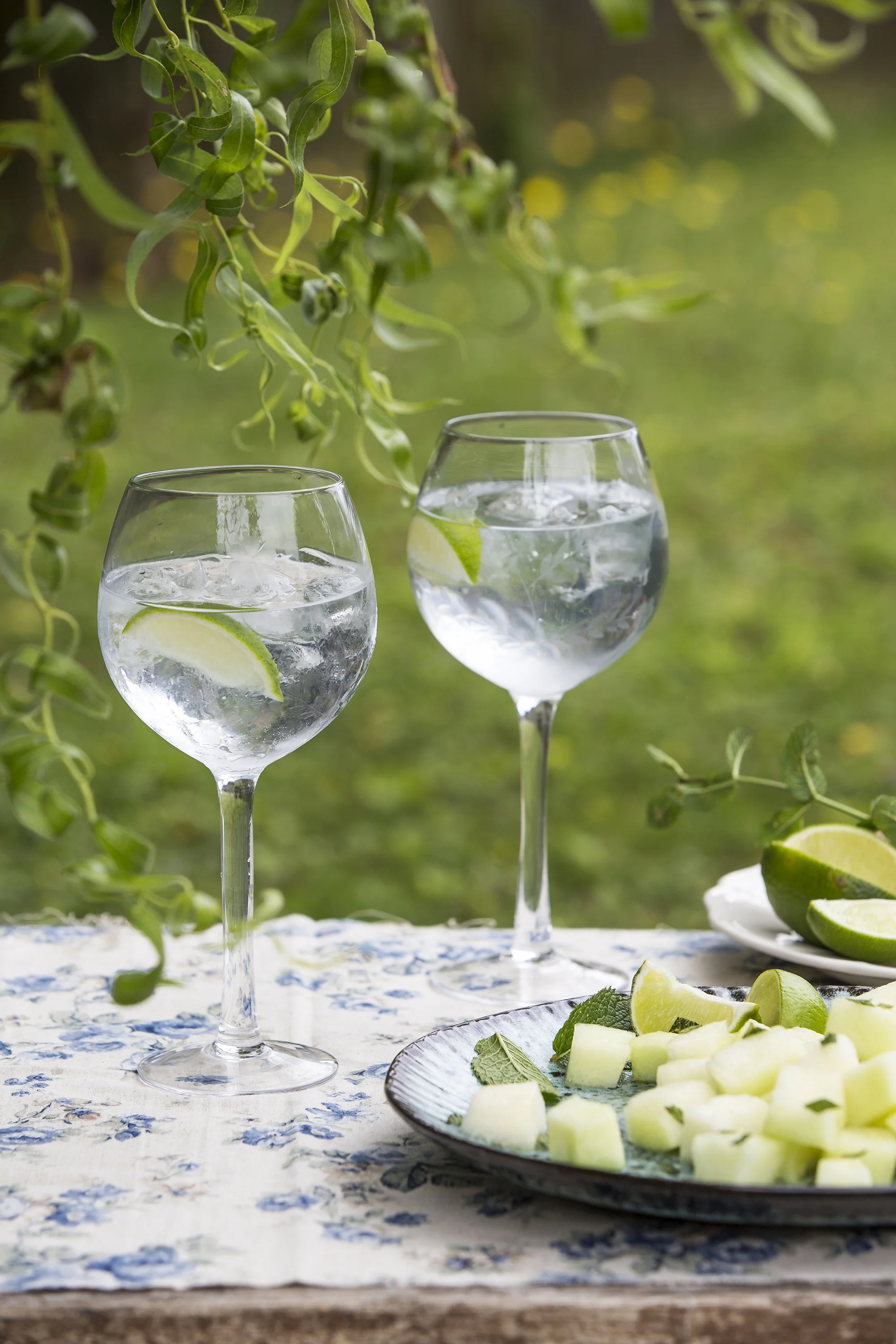 Rippled Wine Glass by Bloomingville , £10.50, Stoneware Speckled Dinner Plate by Madame Stoltz , £14, both Elkins / Other items , stylists and photographers own