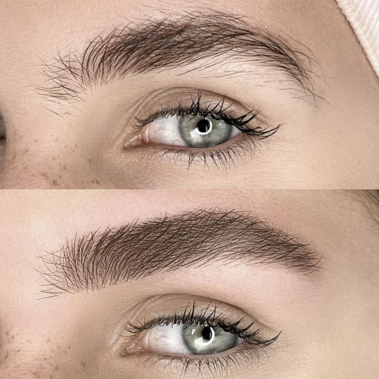 Close-up of a person's eye and eyebrow, showing microblading details with the eye open and looking slightly to the right.