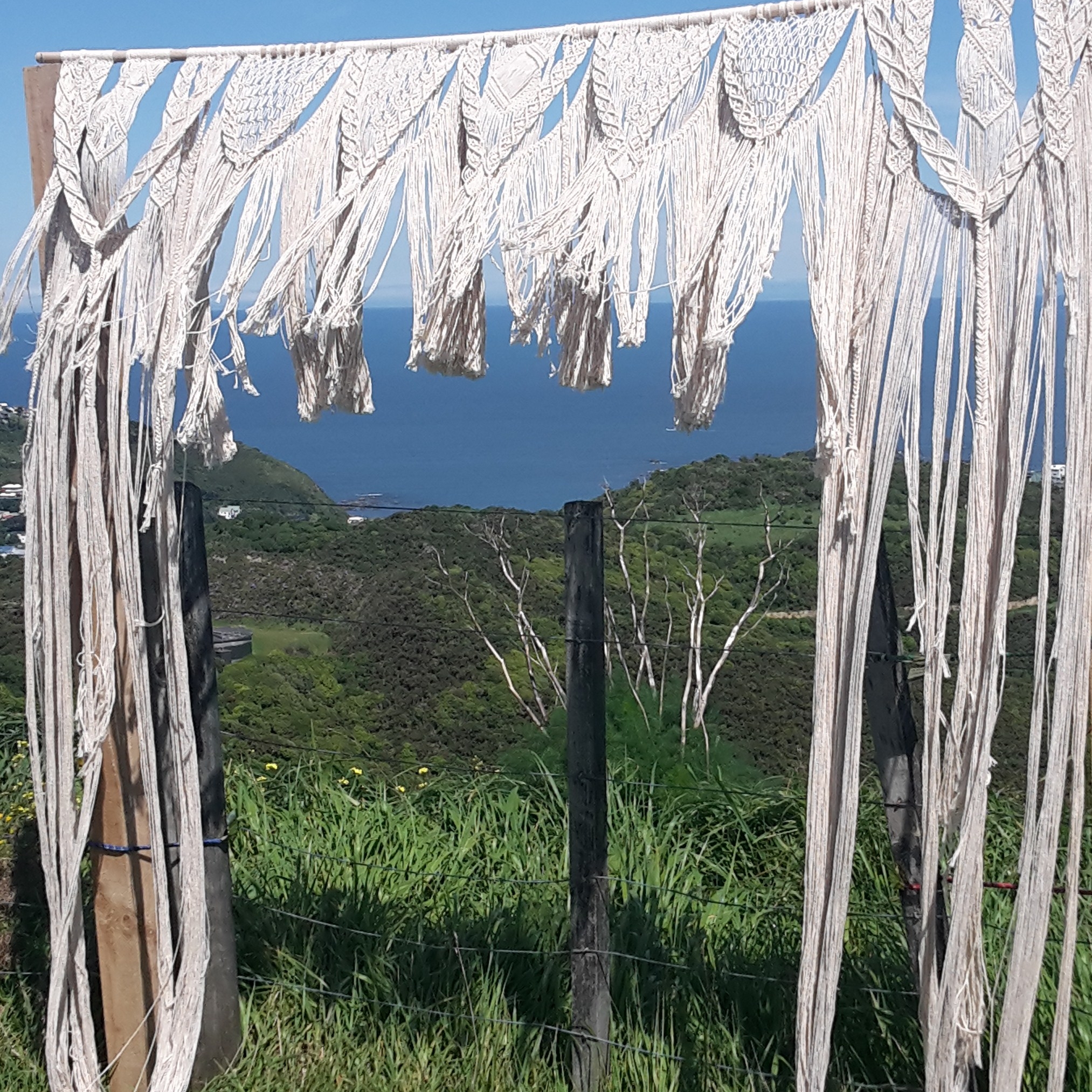 MACRAME ARCH/BACKDROP I $70 One of a kind Macrame backdrop This incredible piece can be hung, draped or added to an arch to create a unique statement on your day. Arch hired separately