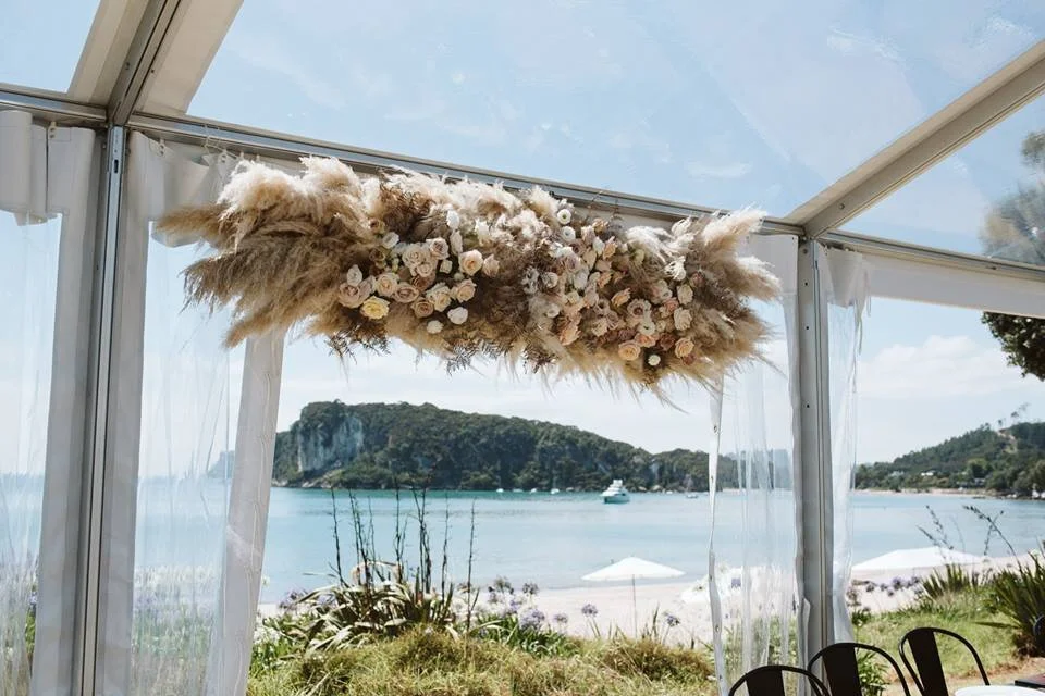 Toi Toi Wedding New Zealand Hanging installation Auckland Wedding Florist Table Flower Studio Front Beach.jpg