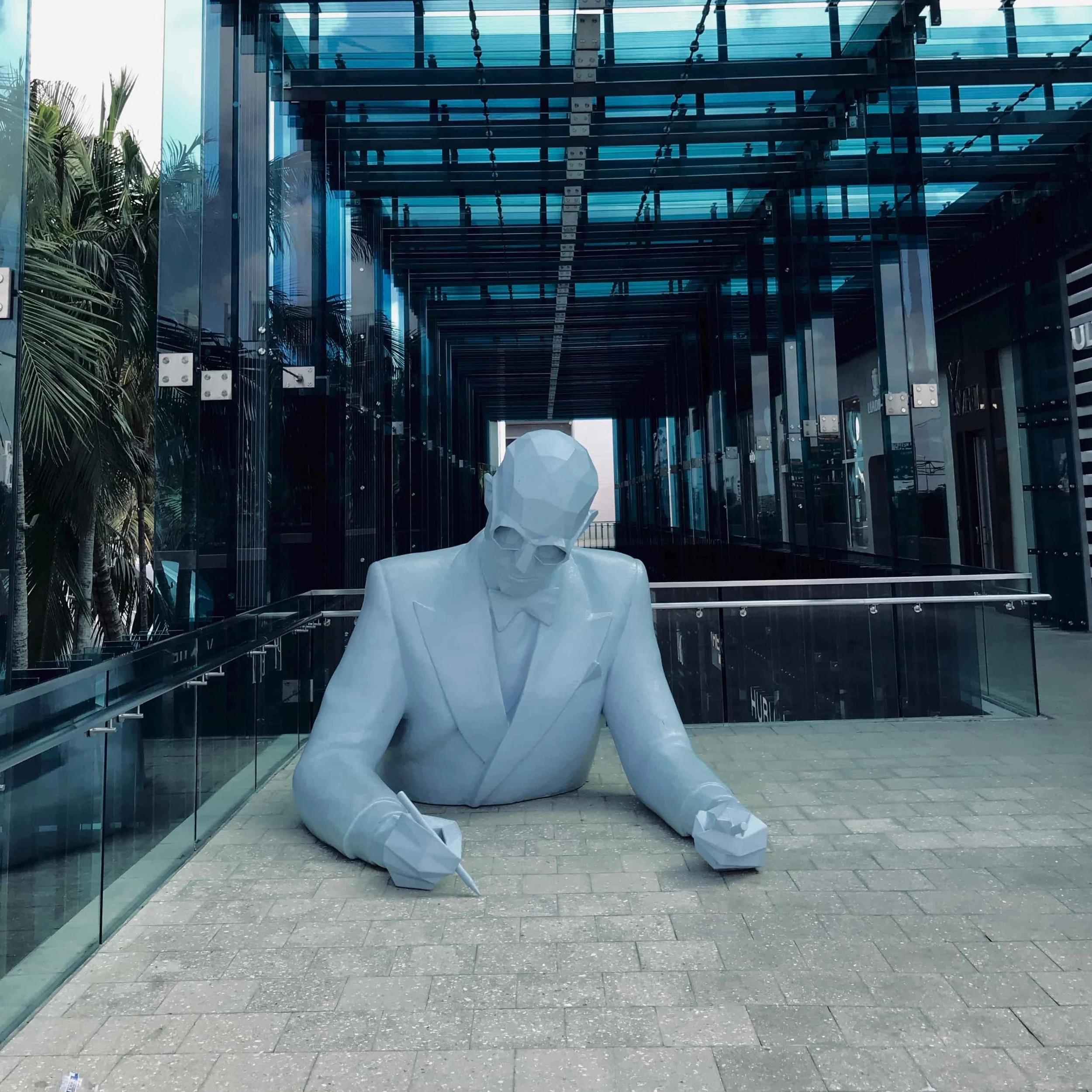 Le Corbusier’s bust, a sculpture by Xavier Veilhan, sits in the Palm Court #atMDD