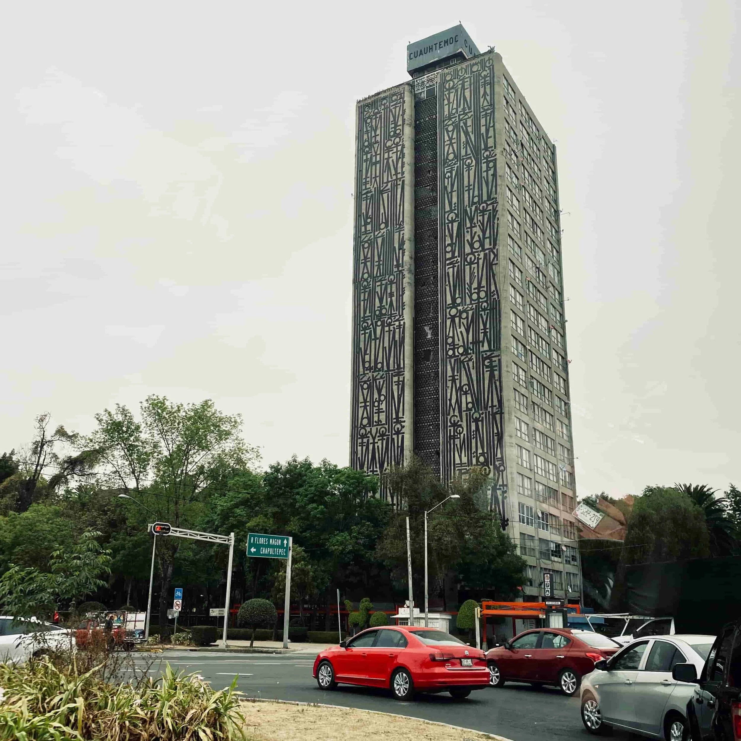 Escaleras al Sol, a mural by Retna covers one side of Mario Pani's Cuautemoc building in CDMX