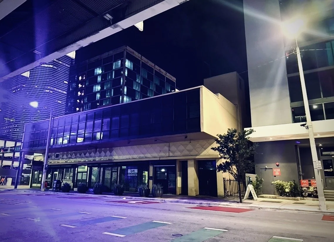 Vacant street level retail space in downtown Miami at night