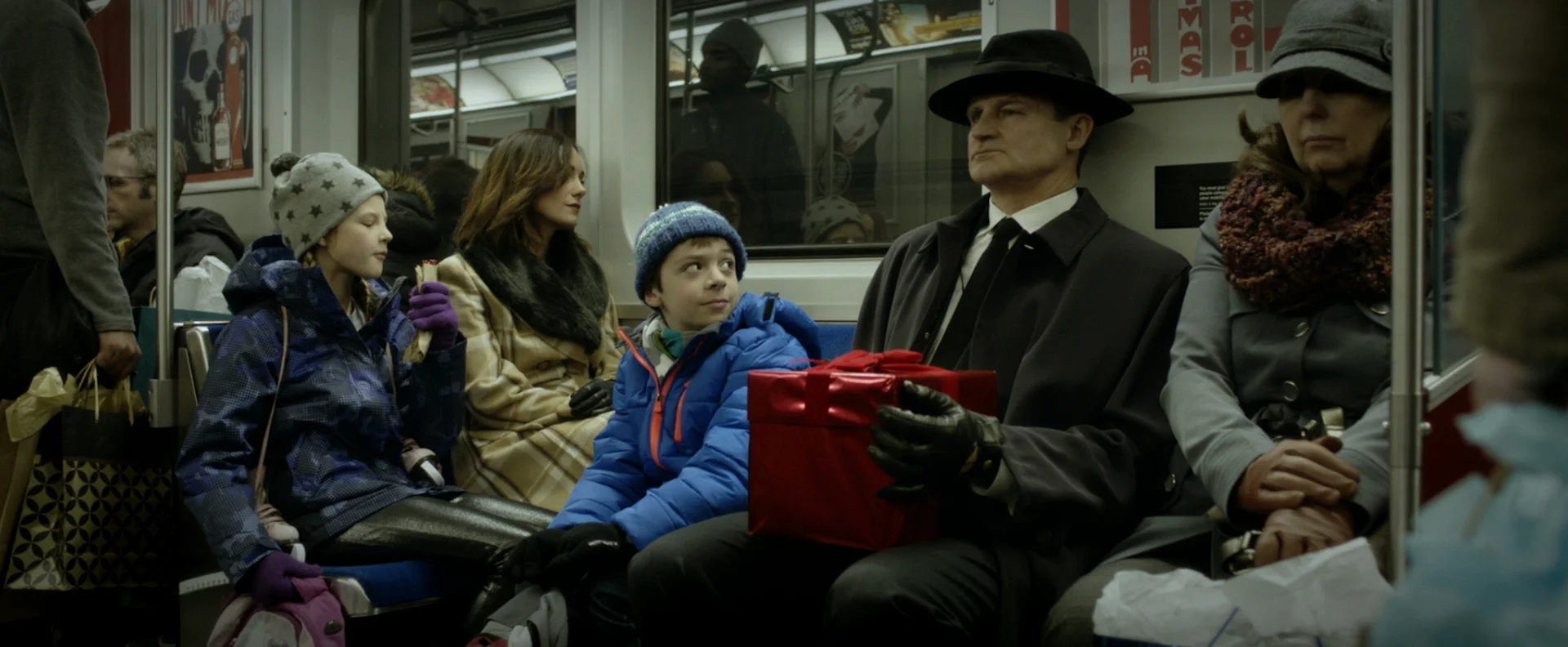 After peering into a shiny red gift box on a commuter train, seven-year-old Danny Jacobs inexplicably stops eating. When his father and sister also begin to waste away, Danny’s mother Susan struggles to make the connection between herself, her dying family and the mysterious box before it’s too late.