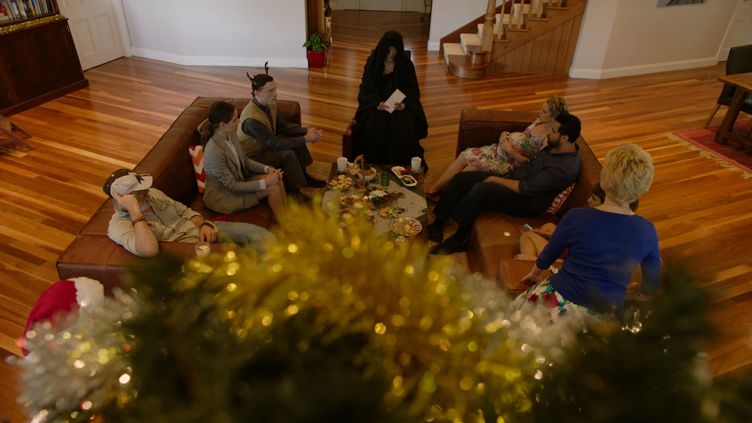 Cast at Tree woth Cletus 01 - Red Christmas Photo by Douglas Burdorff.jpeg