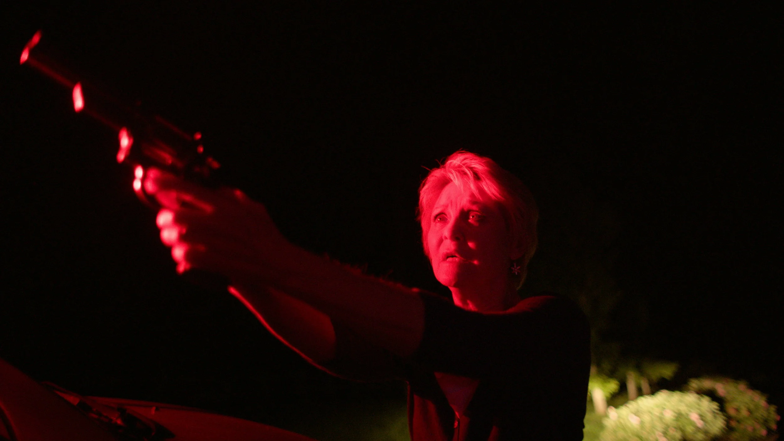 Dee Wallace with Gun in Red Light - Red Christmas Photo by Douglas Burgdorff.jpeg