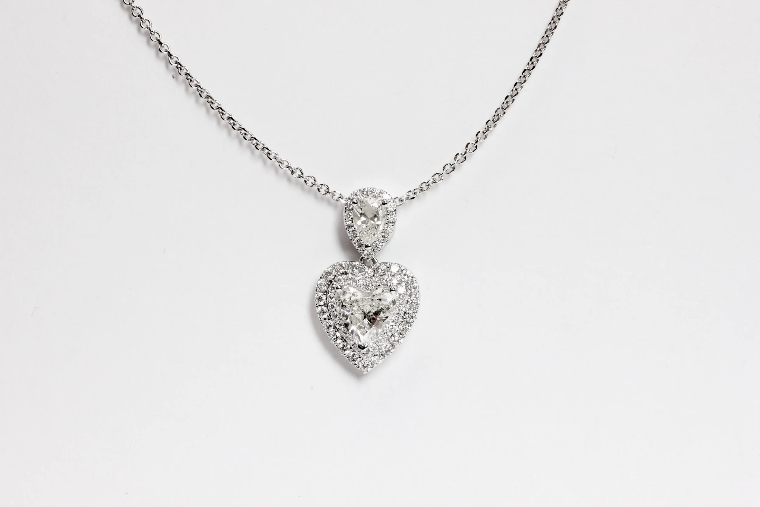 Diamond Heart &amp; Pear Shape Halo Pendant