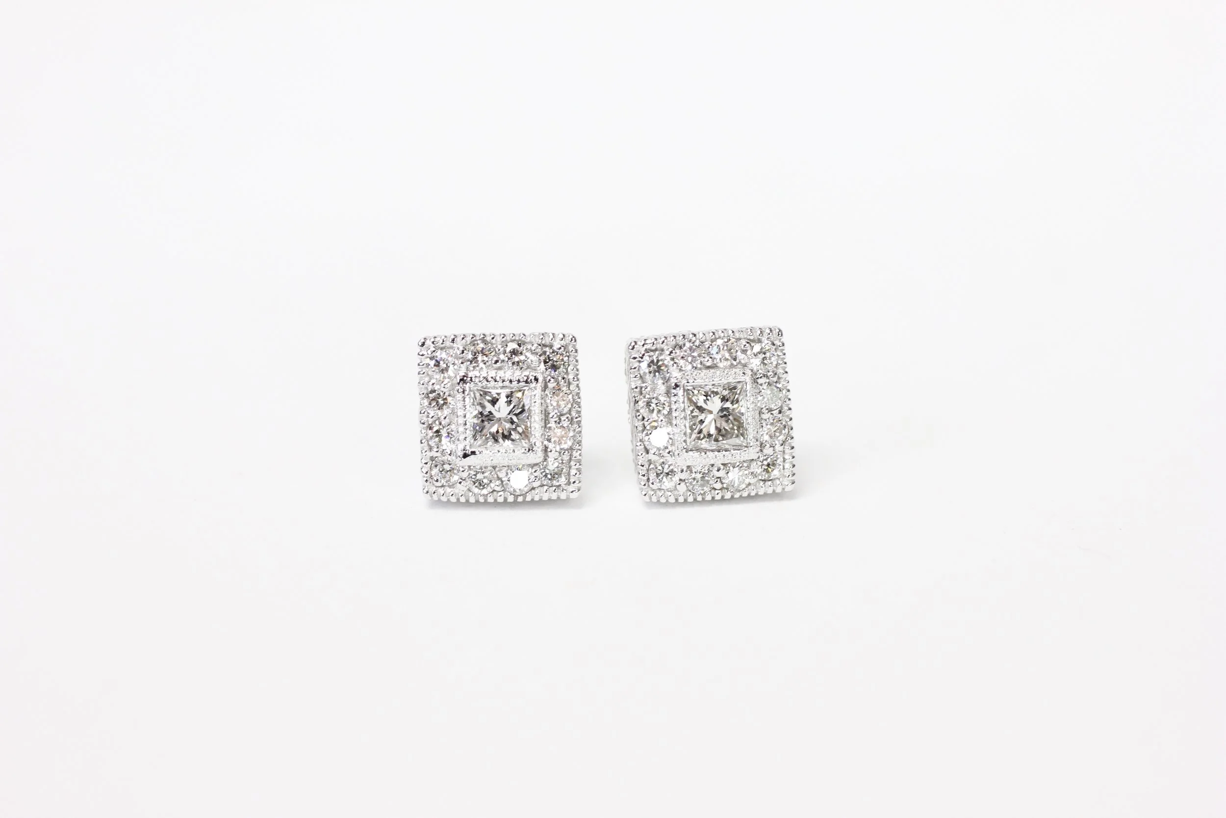 Tesa princess cut diamond halo earrings with millgrain