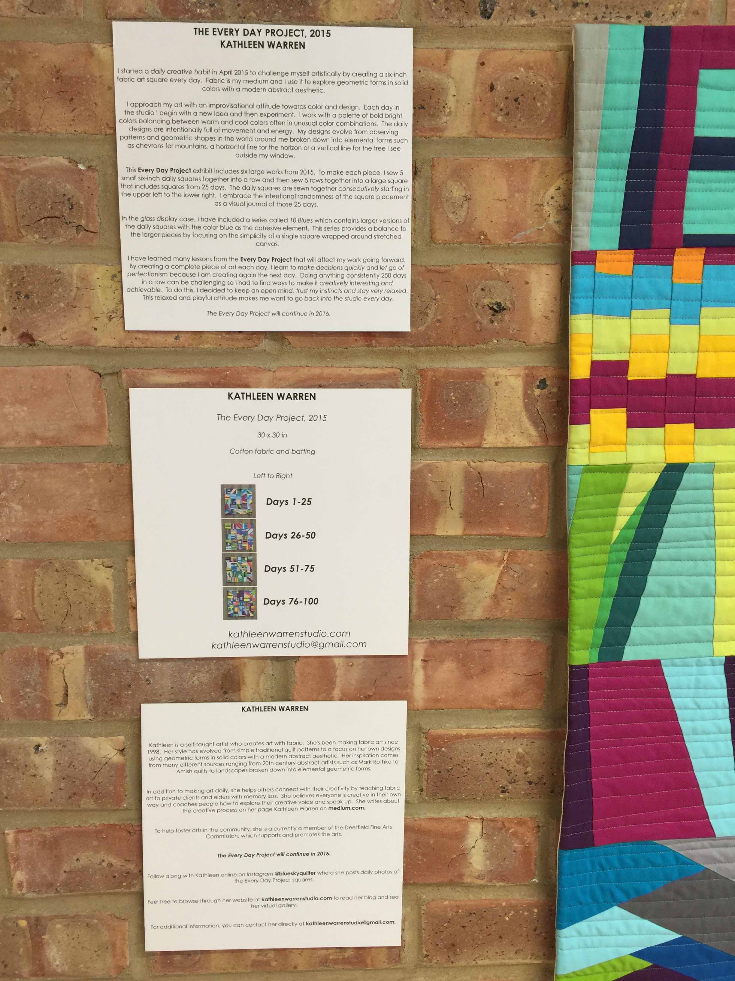 Top to bottom: Artist statement, Wall label for the first 100 days quilts, and Artist bio. I printed the labels on my home printer. Then, The Great Frame Up glued the paper to a mat board using a tissue glue sheet. The final step was to cut the wall label to the square size.