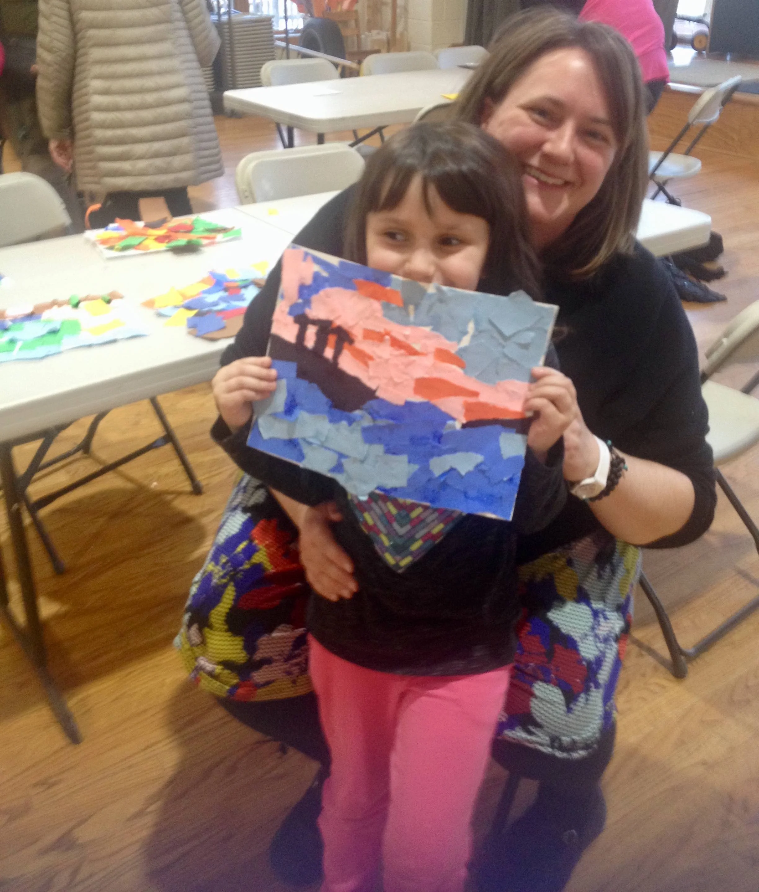 Mother and daughter in the workshop holding "Hawaii Sunset"