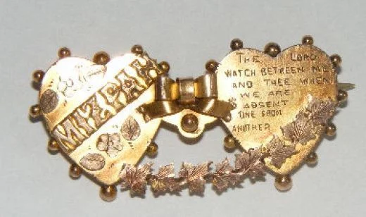 Typical Mizpah brooch in gold