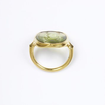 Mid 19th century Ring, peridot intaglio set in gold V&A Museum