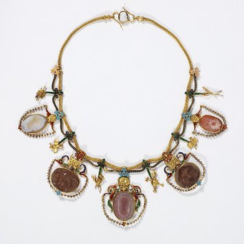 England, c. 1867 Necklace enameled gold, hung with cameos of chalcedony and onyx Firm of John Brogden V&A Museum