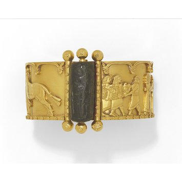 England, c. 1860 Gold bracelet with a steatite cylinder seal Repousse work
