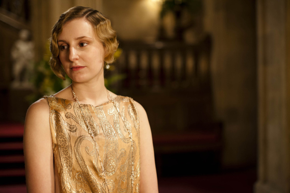Lady Edith wearing very long delicate chain.