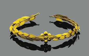 Archaeological revival gold head ornament, by Castellani Christie’s Sale 6968