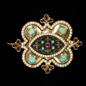 Enamelled gold brooch, set with a ruby, cabochon garnets, turquoises and pearls, England,1848 V&A Museum