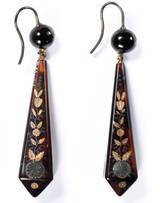 Earrings, tortoiseshell inlaid with gold and silver (piqué posé), English, ca. 1850. Photo copyright of Victoria and Albert Museum, London